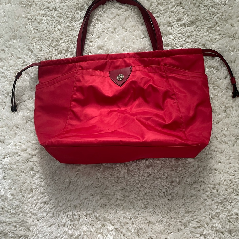 RED ANNE KLEIN BAG. LOTS OF COMPARTMENTS
